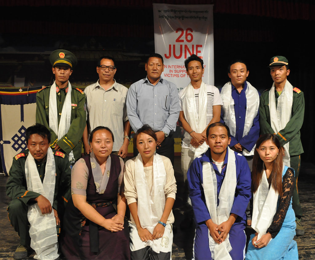 A gorup photo of the actors with Additional Secretary Mr Tsewang Ngodup and tibetan settlement officer Mr Dawa Rinchen.