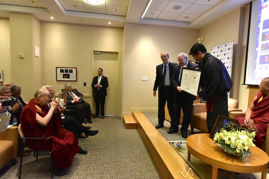 Sikyong receiving NED's citation honouring Tibetan democracy in the presence of his Holiness the Dalai Lama, 15 June 2016.