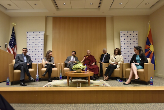 His Holiness the Dalai Lama at the panel discussion with four