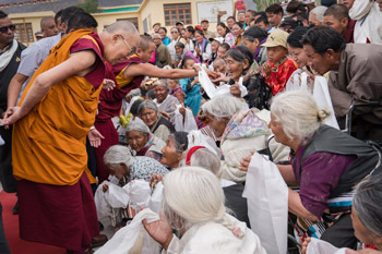 His Holiness the Dalai Lama greeting elderly members of the Tibetan community on his arrival at SOS TCV Choglamsar in Ladakh, J&K, India on August 7, 2016. Photo/Tenzin Choejor/OHHDL