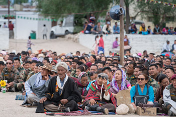 Members of the local community listening to His Holiness the Dalai Lama speaking at the SOS TCV Choglamsar school football ground in Ladakh, J&K, India on August 7, 2016. Photo/Tenzin Choejor/OHHDL