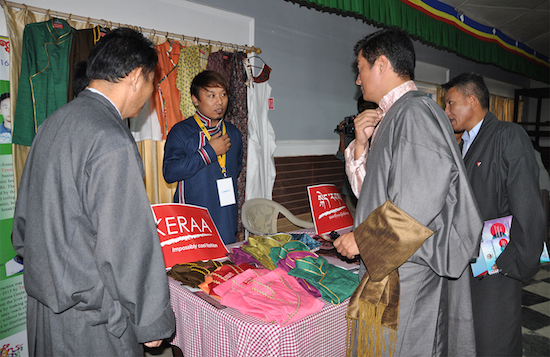 Sikyong Dr Lobsang Sangay, Kalon Karma Yeshi and SARD Secretary Mr Ngodup Dorjee inspecting an exhibition stall by a Tibetan entrepreneur.