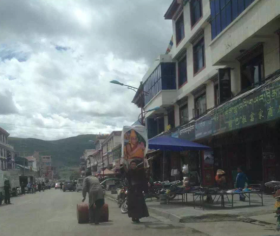 Jamphel Gyatso calling for return of His Holiness the Dalai Lama to Tibet, at Dzongkar street on 9 September 2015.