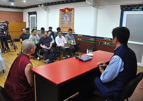 Sikyong speaking to the visiting Korean press and Buddhists.