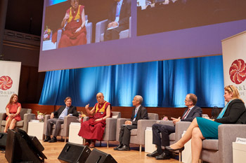 His Holiness the Dalai Lama delivering his closing remarks at the end of the afternoon session of the Mind & Life Dialogue at the Bozar Centre in Brussels, Belgium on September 9, 2016. Photo/Olivier Adam