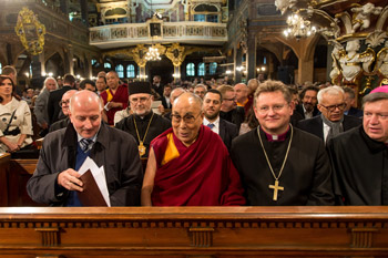 His Holiness the Dalai Lama sitting in the front row of the Church of Peace in Swidnica, Poland on September 21, 2016. Photo/Maciej Kulczynski