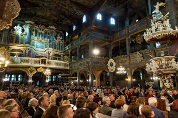 Members of the congregation listening to His Holiness the Dalai Lama speaking at the Church of Peace in Swidnica, Poland on September 21, 2016. Photo/Maciej Kulczynski