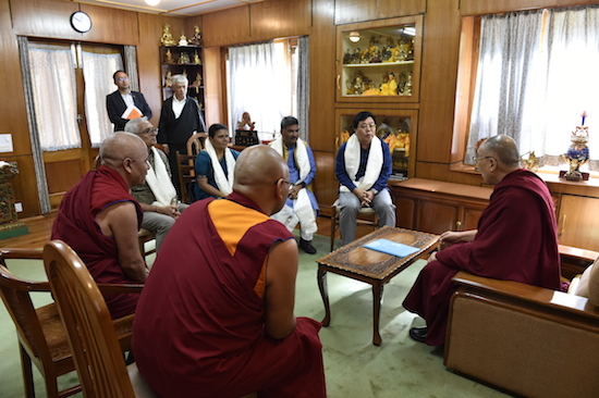 His Holiness the Dalai Lama with the visiting dignitaries.