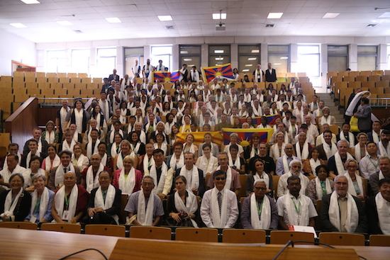Delegates at the 7th International Conference of Tibet Support Groups posing for a group photo.