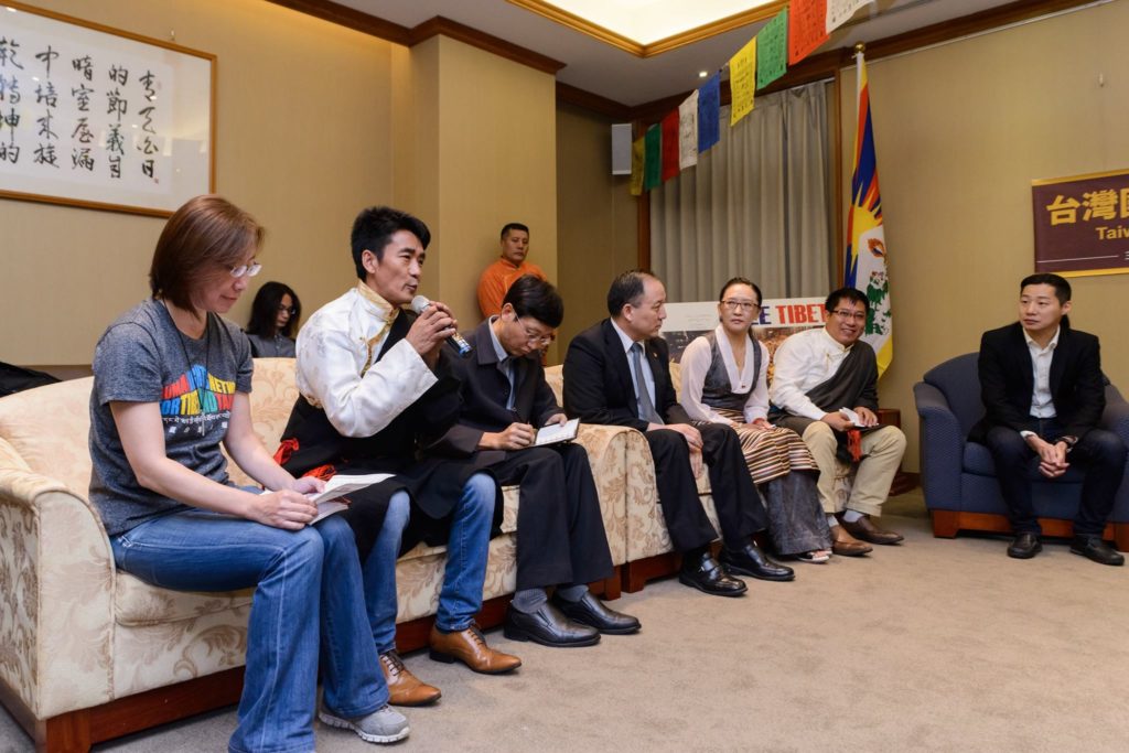 The press conference in progress.