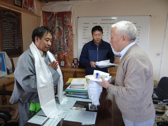 Outgoing General Secretary Mr Dhondup Dorjee handing over the charge to Mr Karma Chungdak, new General Secretary of THF, 12 November 2016.