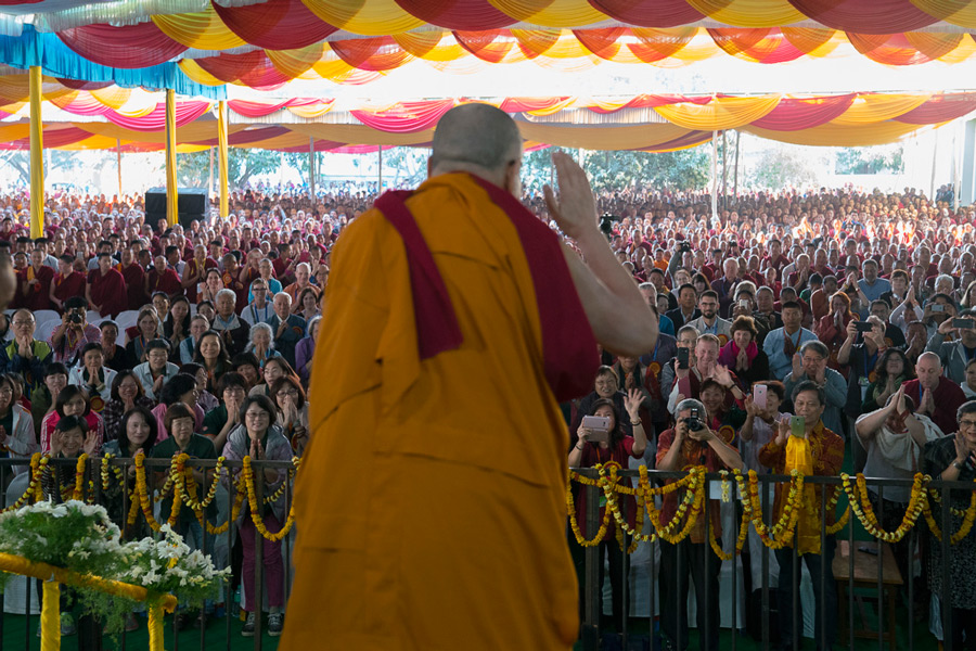 His Holiness the Dalai Lama greeting the crowd at the start of ceremonies celebrating the 600th Anniversary of Drepung Monastery at Drepung Lachi in Mundgod, Karnataka, India on December 21, 2016. Photo/Tenzin Choejor/OHHDL