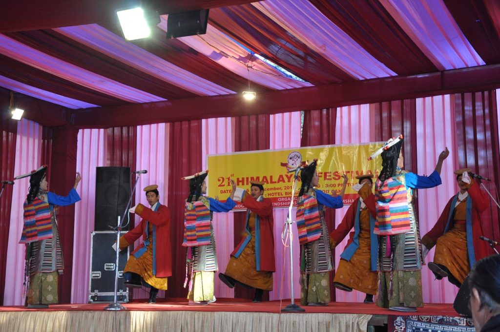 Tibetan artistes performing a cultural dance at the festival.