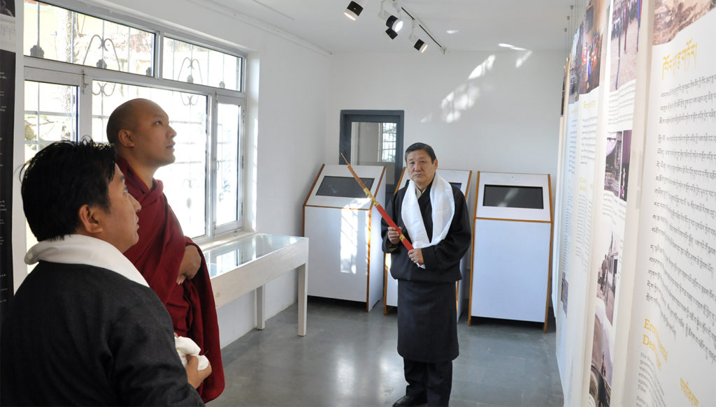 Gyalwang Karmapa Rinpoche viewing a panel on exhibition at Tibet Museum, 14 December 2016.
