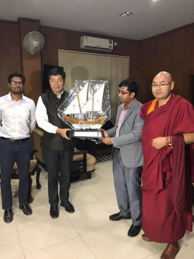 Sikyong Dr Lobsang Sangay was presented a memento by Mr , DC of Karwar, in Karnataka state.