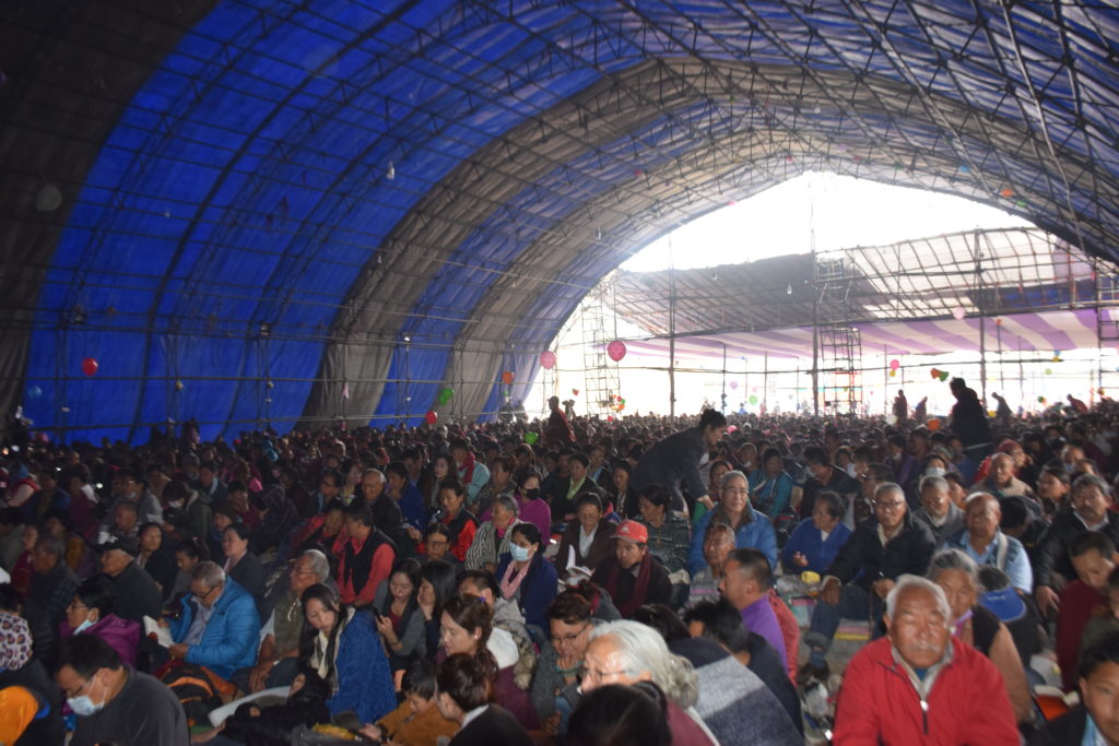 One of the two extra tents filled to capacity with devotees.