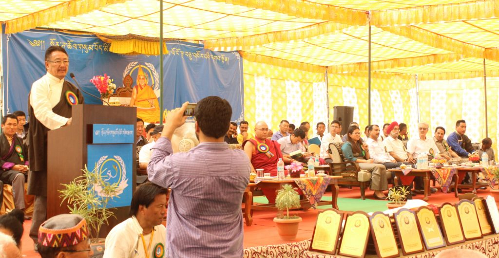 Home Kalon Addressing the public at the golden jubilee celebration of Paonta Cholsum Tibetan settlement.