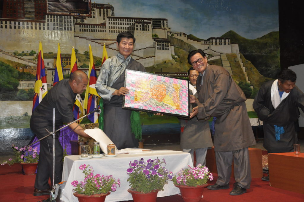 Mr Duk Tsering, Principal of Selakui school presenting Sikyong with aan art work done by a student, 1 April 2017.