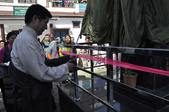 Sikyong inaugurating a pillar erected by residents of Paonta Cholsum in memory of Tibetan self-immolaters, 2 April 2017.