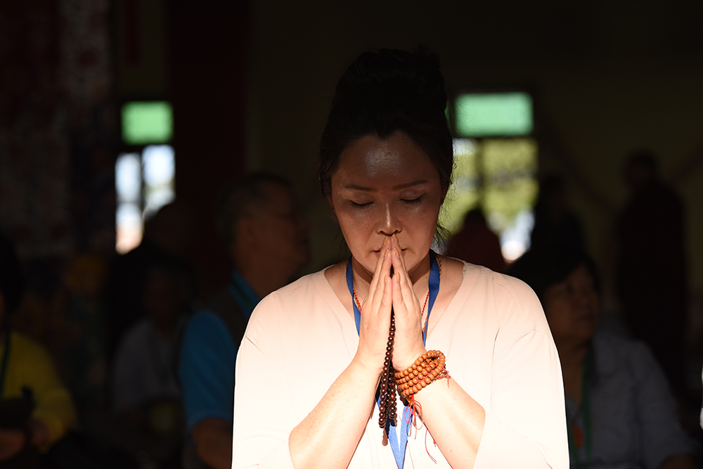 A devotee engrossed in meditative reflection. Photo/ Tenzin Jigme/ CTA