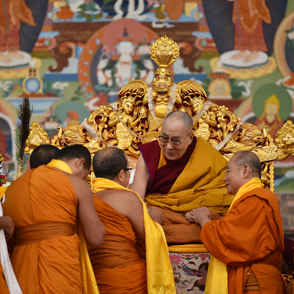 His Holiness the Dalai Lama interacting with some monks during the Manjushri teachings at the Kalachakra grounds in Bodhgaya. Phto/ Pasang Dhondup/ CTA