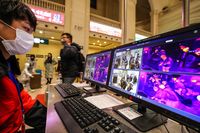 Passengers are scanned with thermal scanners at Hankou railway station in Wuhan on Jan. 21. Source: AFP via Getty Images