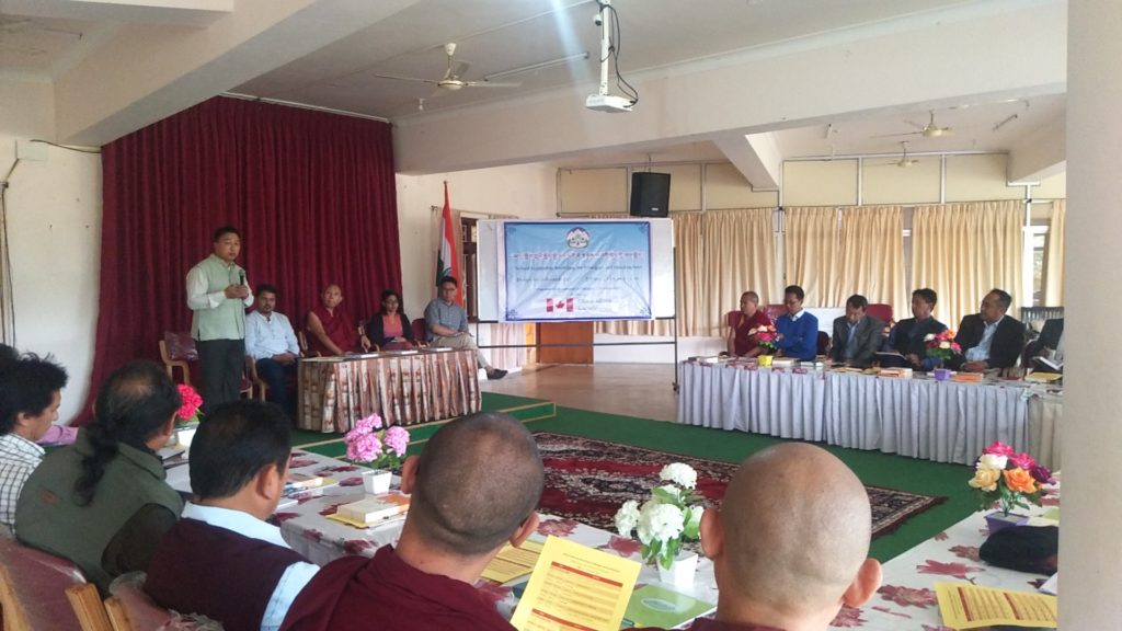 Mr Tenzin Dorjee, Head of Academic Section, DOE addressing the participants at the opening ceremony of the workshop; Special guest, Geshe Tashi Tsering, Abbot of Sera Mey Monastic University, Bylakuppe