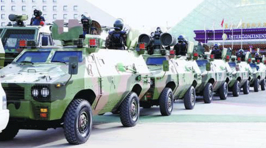 Vehicles belonging to China's People's Armed Police are shown on parade in Lhasa, 6 March 2020.
