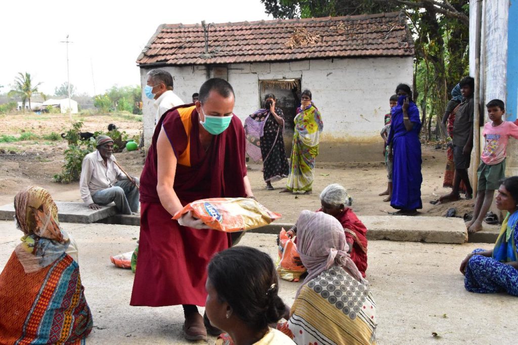 Monks of Sera Jey Khe Nyen Dratsang and Sera Mey Thoesam Norling monastery distribute ration supplies to the Indians.