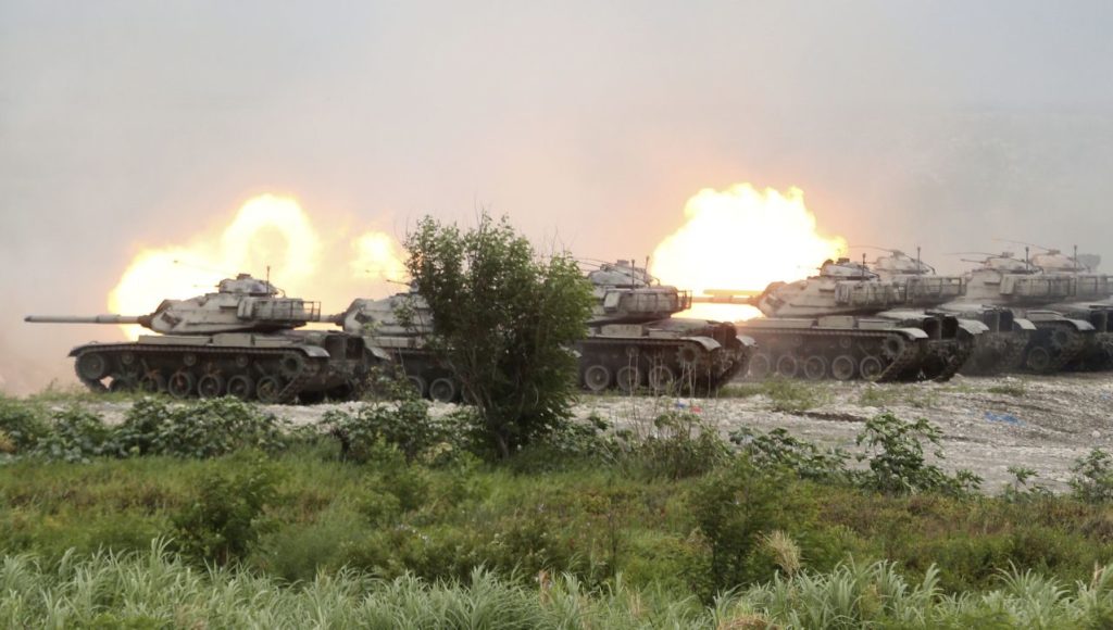 M60A3 Patton main battle tanks in a line fire during the 36th Han Kung military exercises in Taichung City, central Taiwan, Thursday, July 16, 2020. (AP Photo/Chiang Ying-ying)