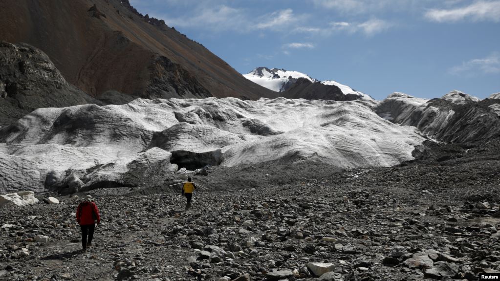 Glaciers in China's bleak, rugged Qilian mountains are disappearing at a shocking rate as global warming brings unpredictable change and raises the prospect of crippling, long-term water shortages, scientists say. (REUTERS/Carlos Garcia Rawlins)
