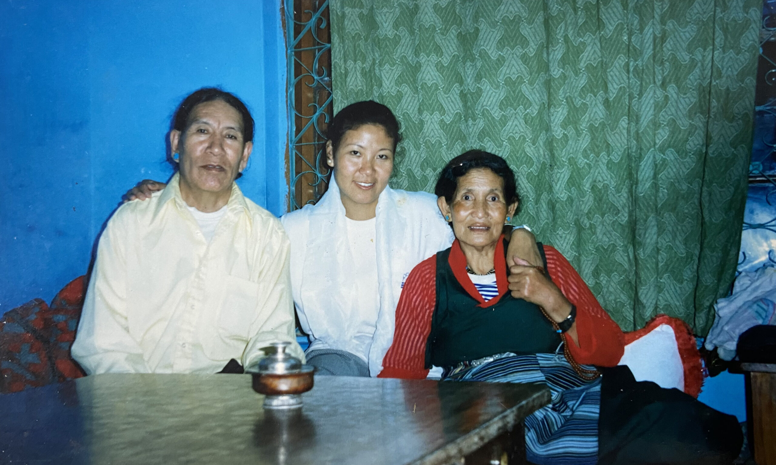 Tsering Lhamo with her parents, 1995. 