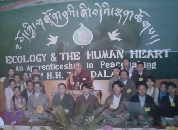 A group photo with His Holiness the 14th Dalai Lama during first Peace Jam Workshop at Upper TCV in 1999.