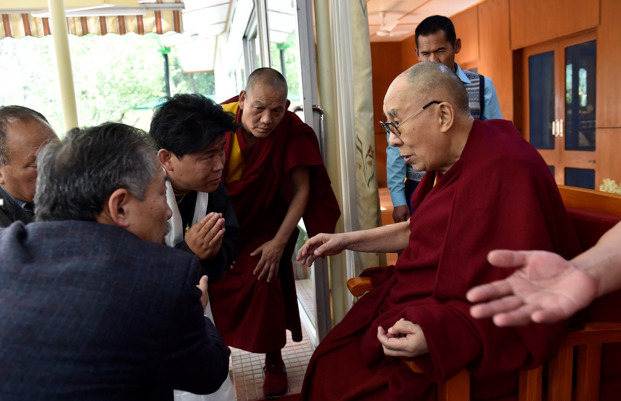Mr. Dawa receives an audience with His Holiness the 14th Dalai Lama in 2019. 