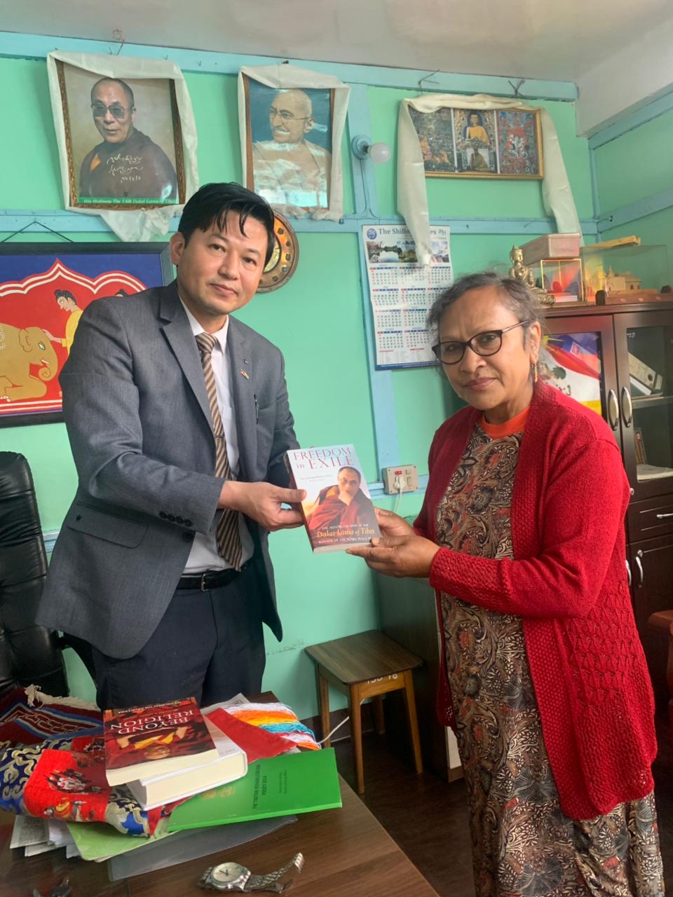 Mr Pema Dhondup presents memento to Patricia Mukhim, Chief Editor of Shillong Times. 