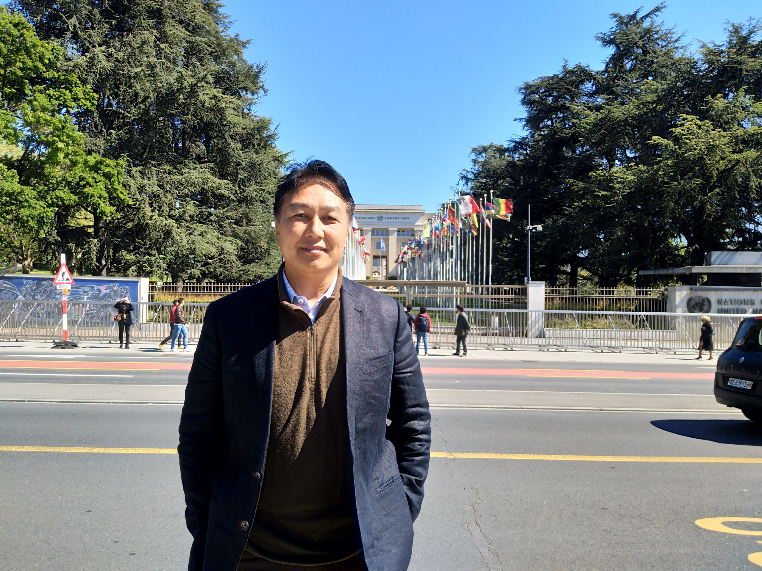 Mr Tenzin Dorjee standing in front of UN office in Geneva during his official tour to Switzerland in June 2019. 