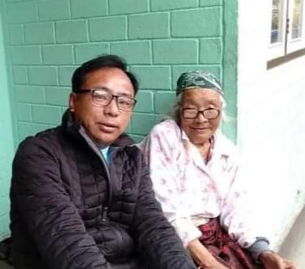 Mr Karma Tenpa with his mother. 