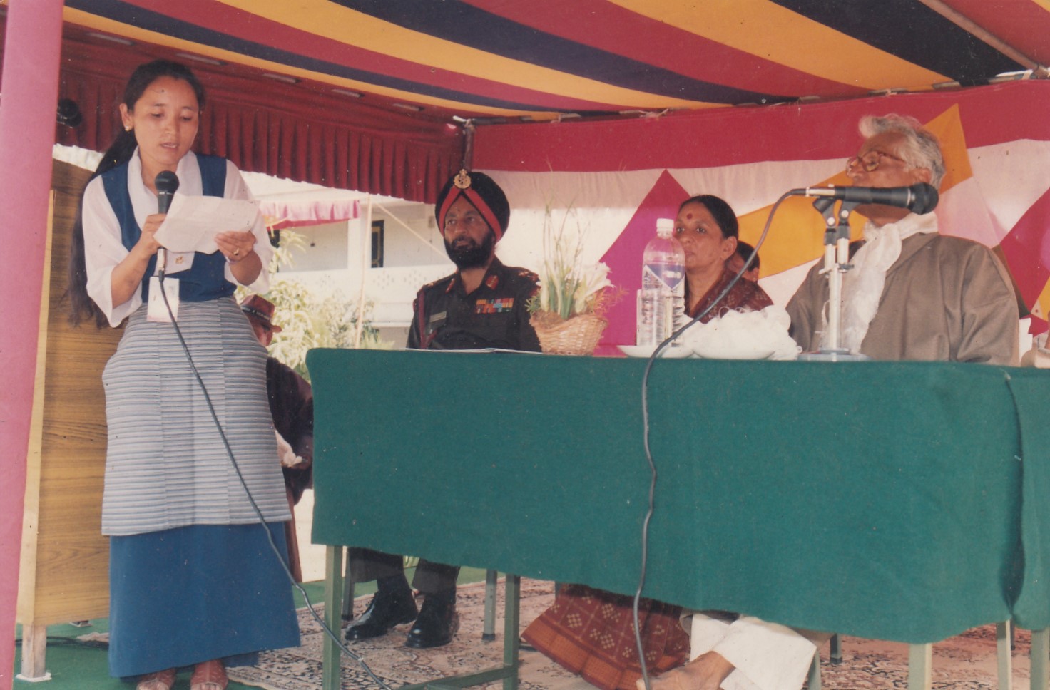 Mrs. Karma Dolma as the Herbertpur Tibetan Settlement Officer, delivering speech during the visit of Shri George Fernandes, then Defence Minister of India, IG SFF G.S. Uban, Ms. Jaya Jaitly, former President of Samata Party, 1998.