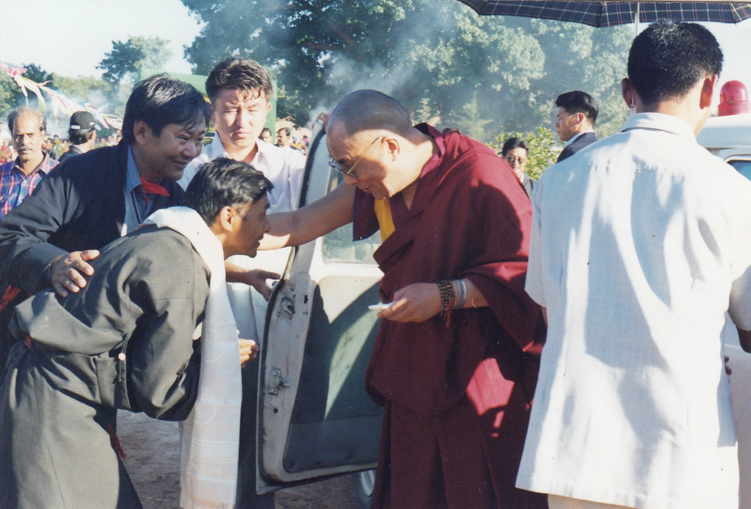 Mr. Tsering Dorjee, Agriculture Extension Officer, welcoming His Holiness the 14th Dalai Lama at Orissa Phuntsokling Tibetan settlement in 1998. 